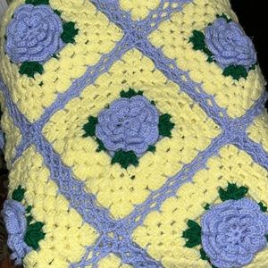 Hand crocheted rose blanket